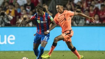 Wilfried Zaha in action for Crystal Palace against Liverpool.