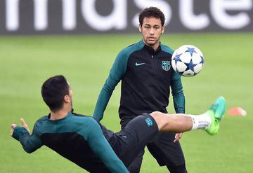Luis Suárez (left) and Neymar train in Turin ahead of this evening's Champions League quarter-final first leg.