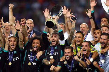 Real Madrid captain Sergio Ramos lifts the UEFA Super Cup trophy.