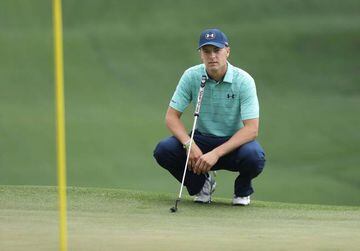 Jordan Spieth of the United States lines up a putt on the seventh green during a practice round prior to the start of the 2017 Masters Tournament