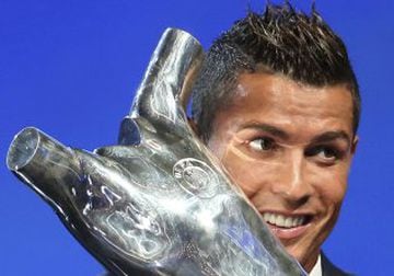 Real Madrid's Cristiano Ronaldo of Portugal reacts as he receives the Best Player UEFA 2015/16 Award during the draw ceremony for the 2016/2017 Champions League Cup soccer competition at Monaco's Grimaldi in Monaco, August 25, 2016.