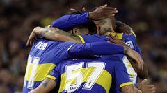 Boca Juniors' midfielder Martin Payero celebrates with teammates after scoring a goal against Belgrano during the Argentine Professional Football League Tournament 2023 match at La Bombonera stadium in Buenos Aires, on May 14, 2023. (Photo by ALEJANDRO PAGNI / AFP)