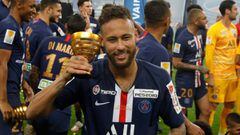 Neymar poses as he celebrates PSG&#039;s victory in the French League Cup final against Lyon. 