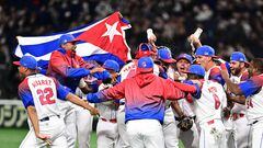 Members of Cuba's team celebrate their 4-3 victory in the World Baseball Classic (WBC) quarter-final game between Cuba and Australia at the Tokyo Dome in Tokyo on March 15, 2023. (Photo by Philip FONG / AFP)