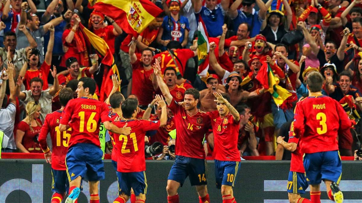 DONETSK, UKRAINE - JUNE 23:  Xabi Alonso of Spain celebrates after scoring the first goal with team mates during the UEFA EURO 2012 quarter final match between Spain and France at Donbass Arena on June 23, 2012 in Donetsk, Ukraine.  (Photo by Martin Rose/