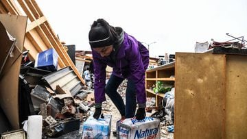As US President Joe Biden toured tornado-ravaged Kentucky cities and towns pledging the government would foot 100% of the bill for emergency relief for the next 30 days, the flow of aid has lagged behind in some more remote pockets of the state. 