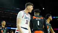 Apr 1, 2023; Houston, TX, USA; Connecticut Huskies center Donovan Clingan (32) reacts after a play against the Miami (Fl) Hurricanes during the first half in the semifinals of the Final Four of the 2023 NCAA Tournament at NRG Stadium. Mandatory Credit: Bob Donnan-USA TODAY Sports