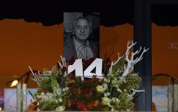 A picture shows a picture on a flower display in memory of late Dutch football legend Johann Cruyff prior to the friendly football match between the Netherlands and France at the Amsterdam ArenA, on March 25, 2016, in Amsterdam. Cruyff passed away on Marc