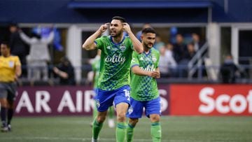 Seattle Sounders midfielder Alexander Roldan celebrates after teammate Raul Ruidiaz's goal during the second leg CONCACAF Champions League final match between Seattle Sounders and Pumas UNAM at Lumen Field in Seattle, Washington on May 4, 2022. (Photo by Jason Redmond / AFP)
