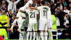 Real Madrid's Spanish forward Lucas Vazquez (C) celebrates with teammates after scoring his team's second goal during the Spanish league football match between Real Madrid CF and Sevilla FC at the Santiago Bernabeu stadium in Madrid, on October 22, 2022. (Photo by JAVIER SORIANO / AFP)