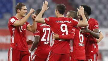 MUNICH, GERMANY - JUNE 10: Robert Lewandowski #9 of Muenchen celebrates his team&#039;s second goal with teammates during the DFB Cup semifinal match between FC Bayern Muenchen and Eintracht Frankfurt at Allianz Arena on June 10, 2020 in Munich, Germany. 