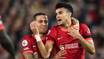 Liverpool (United Kingdom), 19/04/2022.- Luis Diaz (R) of Liverpool celebrates with teammate Thiago (L) after he assisted for the 3-0 goal during the English Premier League soccer match between Liverpool and Manchester United in Liverpool, Britain, 19 April 2022. (Reino Unido) EFE/EPA/PETER POWELL EDITORIAL USE ONLY. No use with unauthorized audio, video, data, fixture lists, club/league logos or 'live' services. Online in-match use limited to 120 images, no video emulation. No use in betting, games or single club/league/player publications
