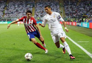 Cristiano Ronaldo being closed down by Stefan Savic.