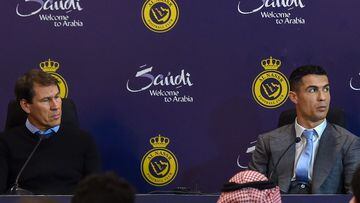 (FILES) In this file photo taken on January 3, 2023, (L to R) Al-Nassr's French coach Rudi Garcia and Portuguese forward Cristiano Ronaldo attend a press conference at the Mrsool Park Stadium in the Saudi capital Riyadh during the unveiling ceremony of Ronaldo. - The Saudi club announced the sacking of Garcia on April 13, 2023. (Photo by AFP)