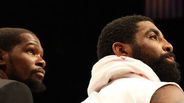 (FILES) In this file photo taken on January 18, 2020 Kevin Durant #7 and Kyrie Irving #11 of the Brooklyn Nets look on during their game against the Milwaukee Bucks at Barclays Center in New York City. NOTE TO USER: User expressly acknowledges and agrees 