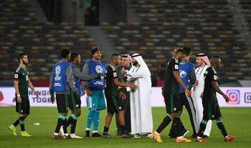 UAE players celebrate their win with local officials during the 2019 AFC Asian Cup Round of 16 football match between UAE and Kyrgyzstan at the Zayed Sports City Stadium in Abu Dhabi on January 21, 2019.