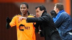Wigan Athletic&#039;s Hugo Rodallega (left) talks to manager Roberto Martinez (right) on the touchline.   (Photo by Clint Hughes/PA Images via Getty Images)