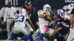 HOUSTON, TX - OCTOBER 16: Andrew Luck #12 of the Indianapolis Colts is stopped by Benardrick McKinney #55 of the Houston Texans and John Simon #51 in the fourth quarter at NRG Stadium on October 16, 2016 in Houston, Texas.   Bob Levey/Getty Images/AFP == FOR NEWSPAPERS, INTERNET, TELCOS &amp; TELEVISION USE ONLY ==
