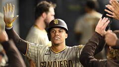 CHICAGO, ILLINOIS - SEPTEMBER 30: Juan Soto #22 of the San Diego Padres celebrates with teammates in the dugout after scoring in the second inning against the Chicago White Sox at Guaranteed Rate Field on September 30, 2023 in Chicago, Illinois.   Quinn Harris/Getty Images/AFP (Photo by Quinn Harris / GETTY IMAGES NORTH AMERICA / Getty Images via AFP)