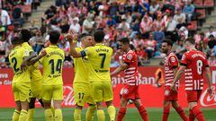 Villarreal's Spanish forward Gerard Moreno (C) celebrates scoring his team's second goal during the Spanish league football match between Girona FC and Villarreal CF at the Montilivi stadium in Girona on May 20, 2023. (Photo by Josep LAGO / AFP)