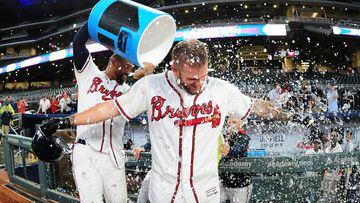 ATLANTA, GA - MAY 23: Matt Adams #18 of the Atlanta Braves is doused by Matt Kemp #27 with the water cooler after knocking in the game-winning run in the ninth inning against the Pittsburgh Pirates at SunTrust Park on May 23, 2017 in Atlanta, Georgia.   Scott Cunningham/Getty Images/AFP == FOR NEWSPAPERS, INTERNET, TELCOS &amp; TELEVISION USE ONLY ==