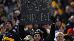 PITTSBURGH, PA - DECEMBER 10: A Baltimore Ravens fan holds up a sign honoring Ryan Shazier #50 of the Pittsburgh Steelers who was injured in a game last week during the game at Heinz Field on December 10, 2017 in Pittsburgh, Pennsylvania.   Joe Sargent/Getty Images/AFP == FOR NEWSPAPERS, INTERNET, TELCOS &amp; TELEVISION USE ONLY ==