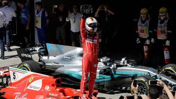 Formula One F1 - Brazilian Grand Prix 2017 - Sao Paulo, Brazil - November 12, 2017  Ferrari&#039;s Sebastian Vettel celebrates winning the race  REUTERS/Paulo Whitaker
