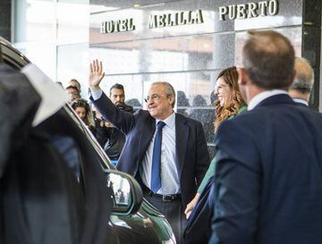 Florentino Pérez waves to fans at Real Madrid's team hotel in Melilla.