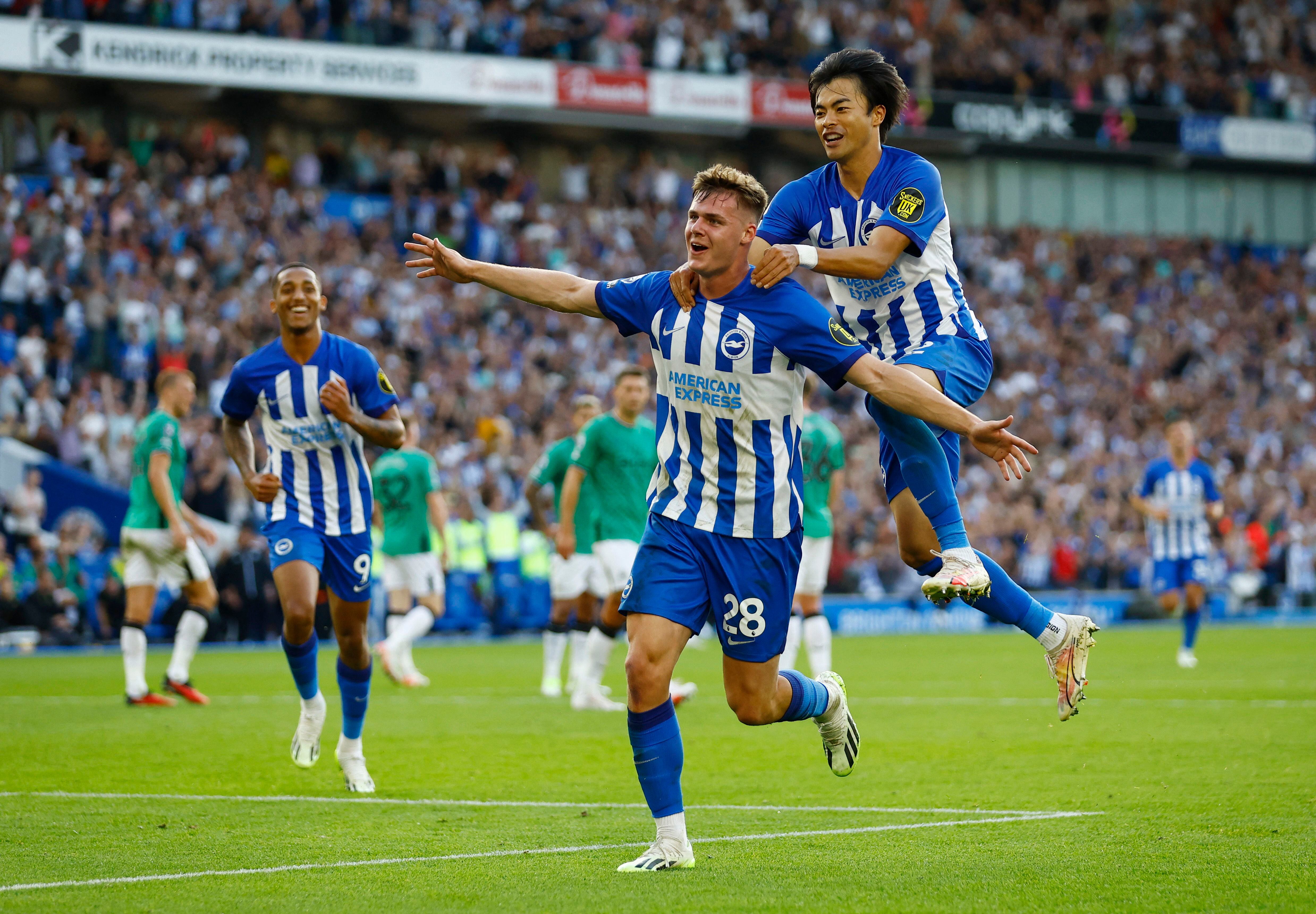 Soccer Football - Premier League - Brighton & Hove Albion v Newcastle United - The American Express Community Stadium, Brighton, Britain - September 2, 2023 Brighton & Hove Albion's Evan Ferguson celebrates scoring their third goal with Kaoru Mitoma Action Images via Reuters/Peter Cziborra EDITORIAL USE ONLY. No use with unauthorized audio, video, data, fixture lists, club/league logos or 'live' services. Online in-match use limited to 75 images, no video emulation. No use in betting, games or single club /league/player publications.  Please contact your account representative for further details.