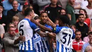 Brighton's Brazilian striker #09 Joao Pedro (C) celebrates with teammates after scoring their third goal during the English Premier League football match between Manchester United and Brighton and Hove Albion at Old Trafford in Manchester, north west England, on September 16, 2023. (Photo by Oli SCARFF / AFP) / RESTRICTED TO EDITORIAL USE. No use with unauthorized audio, video, data, fixture lists, club/league logos or 'live' services. Online in-match use limited to 120 images. An additional 40 images may be used in extra time. No video emulation. Social media in-match use limited to 120 images. An additional 40 images may be used in extra time. No use in betting publications, games or single club/league/player publications. / 
