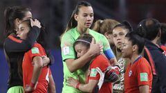 Chile goalkeeper Claudia Endler, center left, hugs teammate Yanara Aedo at the end of the Women&#039;s World Cup Group F soccer match between Thailand and Chile at the Roazhon Park in Rennes, France, Thursday, June 20, 2019. Chile won 2-0, one goal short of the win by three goals difference needed to qualify for the next round. (AP Photo/David Vincent)