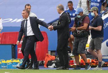 Soccer Football - Premier League - Leicester City v Manchester United - King Power Stadium, Leicester, Britain - July 26, 2020 Manchester United manager Ole Gunnar Solskjaer with Leicester City manager Brendan Rodgers after the match