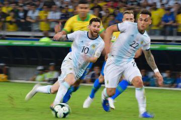 (FILES) In this file photo taken on July 02, 2019 Argentina's Lionel Messi (L) and Lautaro Martinez