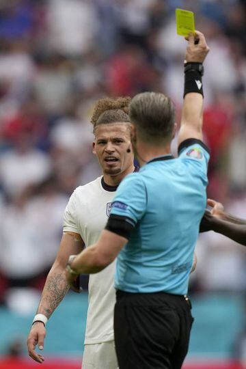 Referee Danny Makkelie shows a yellow card to England's Kalvin Phillips during the Euro 2020 round of 16 match between England and Germany.