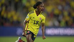 (FILES) Colombia's Linda Caicedo celebrates after scoring against Argentina during the Conmebol 2022 women's Copa America football tournament semifinal match at the Alfonso Lopez stadium in Bucaramanga, Colombia, on July 25, 2022. At the age of 18, she's the heroine of dozens of girls in the small town where she grew up, reached the elite with Real Madrid and will play her third World Cup in less than 12 months: Linda Caicedo, the outstanding young woman of women's soccer in Colombia (Photo by Raul ARBOLEDA / AFP)