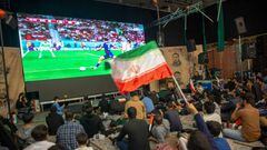 TEHRAN, IRAN - NOVEMBER 29: Iranian football fans watch the Qatar 2022 World Cup Group B football match against the United States in a government center on November 29, 2022 in Tehran, Iran. (Photo by Majid Saeedi/Getty Images)
