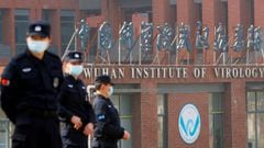 FILE PHOTO: Security personnel keep watch outside the Wuhan Institute of Virology during the visit by the World Health Organization (WHO) team tasked with investigating the origins of the coronavirus disease (COVID-19), in&nbsp;Wuhan, Hubei province, Chin