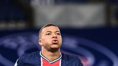 Paris Saint-Germain&#039;s French forward Kylian Mbappe celebrates scoring his team&#039;s third goal during the French L1 football match between Paris Saint-Germain (PSG) and Dijon at the Parc de Princes stadium in Paris on October 24, 2020. (Photo by FR