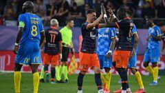 Montpellier&#039;s players react at the end of the French L1 football match between Montpellier and Lens at the Mosson stadium in Montpellier, southern France, on October 17, 2021. (Photo by Pascal GUYOT / AFP)