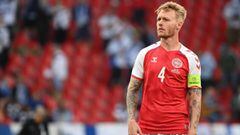 (FILES) In this file photo taken on June 12, 2021 Denmark&#039;s defender Simon Kjaer looks on during the UEFA EURO 2020 Group B football match between Denmark and Finland at the Parken Stadium in Copenhagen. (Photo by Jonathan NACKSTRAND / POOL / AFP)