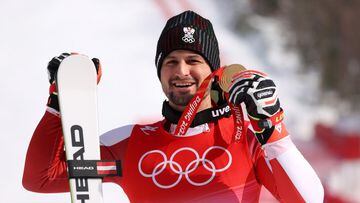 Strolz wins surprise gold to follow in his father's footsteps