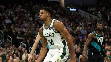 Giannis Antetokounmpo #34 of the Milwaukee Bucks reacts to a dunk against the Portland Trail Blazers during the first half of a game at Fiserv Forum on November 21, 2022 in Milwaukee, Wisconsin.