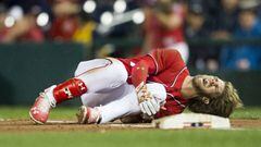 Aug 12, 2017; Washington, DC, USA; Washington Nationals right fielder Bryce Harper (34) reacts after suffering an apparent injury in the first inning against the San Francisco Giants at Nationals Park. Mandatory Credit: Michael Owens-USA TODAY Sports