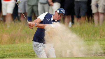 FILE PHOTO: Golf - The 149th Open Championship - Royal St George's, Sandwich, Britain - July 16, 2021 Phil Mickelson of the U.S. plays out of a bunker on the 1st hole during the second round REUTERS/Lee Smith/File Photo