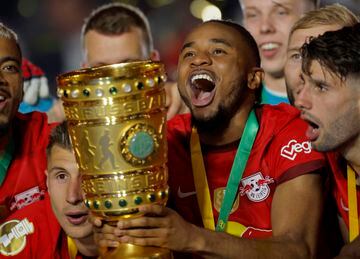 Christopher Nkunku lifted the DFB Pokal trophy in his final game for RB Leipzig.