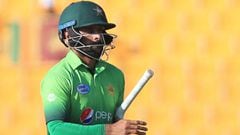 Pakistan&#039;s Muhammad Hafeez leaves the field after being dismissed by Sri Lank&#039;s Nickwella Dickwella during the second one day international (ODI) cricket match between Sri Lanka and Pakistan at Sheikh Zayed Stadium in Abu Dhabi on October 16, 20