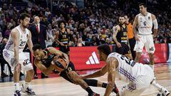 MADRID, SPAIN - DECEMBER 08: Elie Okobo, #0 of AS Monaco competes with Sergio Llull, #23 of Real Madrid and Walter Tavares, #22 during the 2022-23 Turkish Airlines EuroLeague Regular Season Round 12 game between Real Madrid and AS Monaco at Wizink Center on December 08, 2022 in Madrid, Spain. (Photo by Sergio Sanz/Euroleague Basketball via Getty Images)