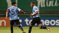 Uruguay's Luciano Rodriguez (R) celebrates after scoring against Chile during the South American U-20 championship first round football match at the Pascual Guerrero Stadium in Palmira, Colombia, on January 22, 2023. (Photo by JOAQUIN SARMIENTO / AFP)