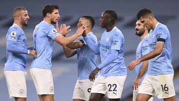 Manchester City&#039;s Benjamin Mendy celebrates with teammates after scoring his side&#039;s third goal during the English Premier League soccer match between Manchester City and Burnley at the Etihad stadium in Manchester, England, Saturday, Nov. 28, 20