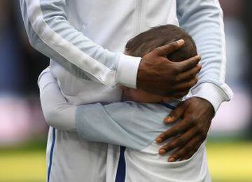 England mascot Bradley Lowery hugs Jermain Defoe of England prior to the FIFA 2018 World Cup Qualifier between England and Lithuania at Wembley.